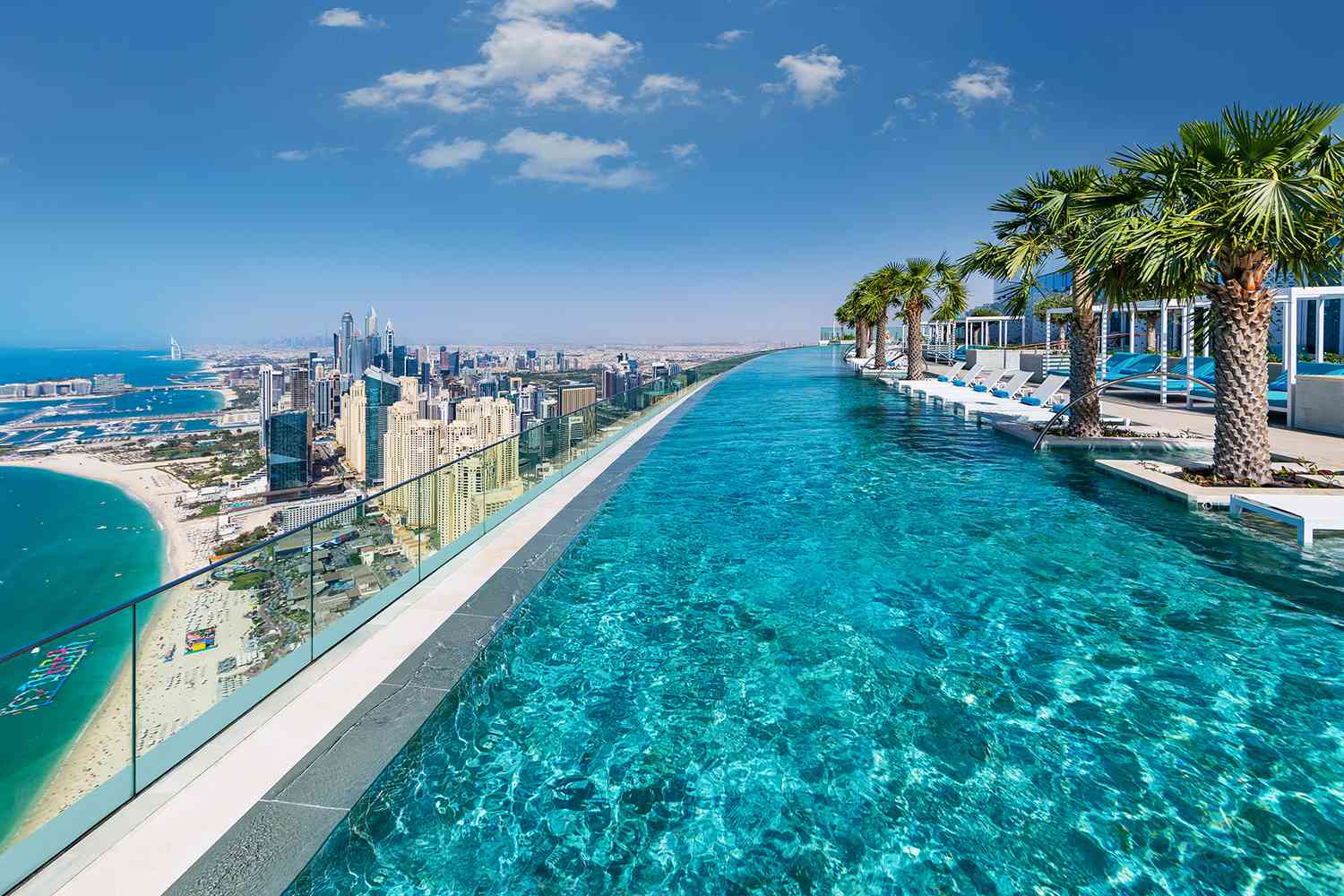 Address Beach Resort 77th floor adults-only rooftop infinity pool JBR Dubai with Marina view sunset
