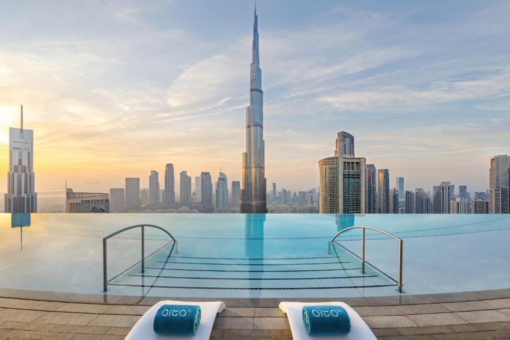 Address Sky View 54th floor adults-only infinity pool with Burj Khalifa view Downtown Dubai sunset