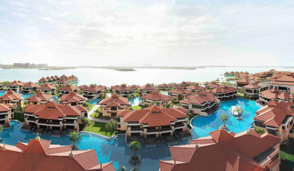 Anantara The Palm Dubai lagoon-access rooms with private beach, overwater villas and Thai spa