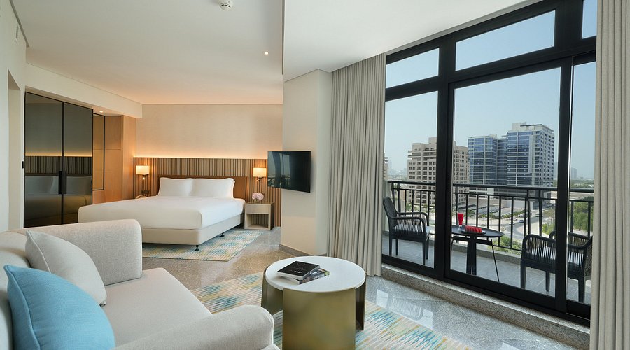 Arabian Park Hotel Dubai Al Jaddaf pool area with contemporary design and city views
