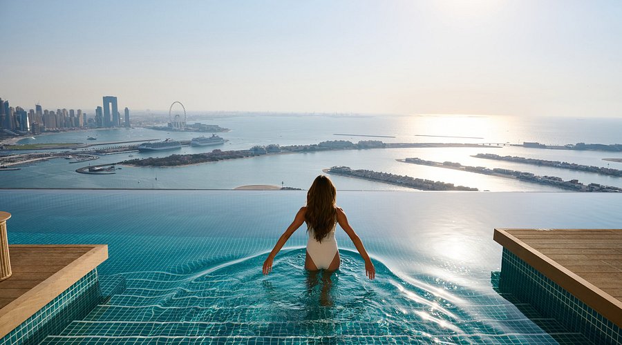 AURA Skypool 360 infinity pool on level 50 of Palm Tower Dubai with panoramic Palm Jumeirah views