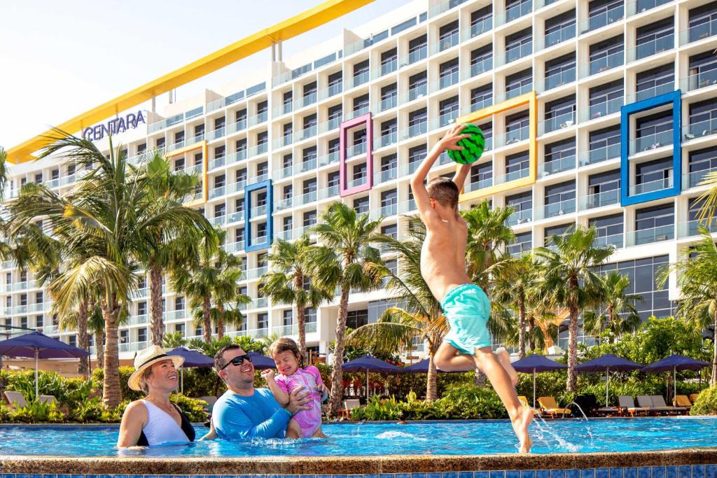 Centara Mirage Beach Resort Dubai family pool and waterpark area with slides on Deira Islands