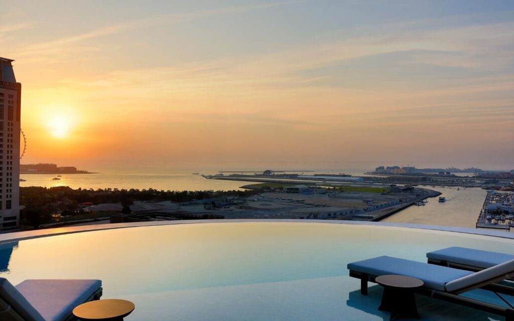 Ciel Dubai Marina Tattu Sky Pool infinity pool on level 76 with Dubai Marina and Arabian Gulf views