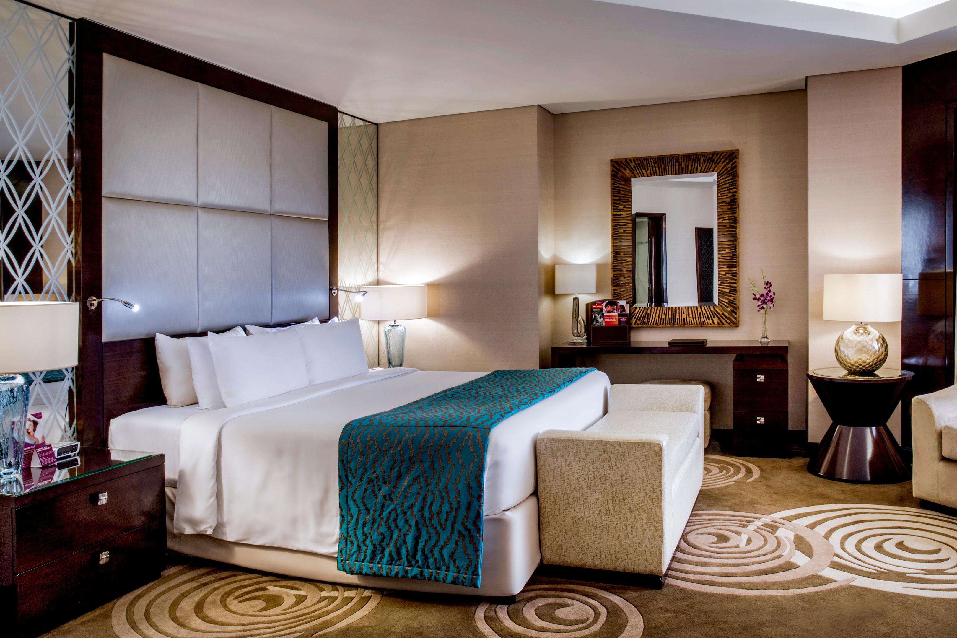 Crowne Plaza Dubai Deira apartment suite with full kitchen and family living area