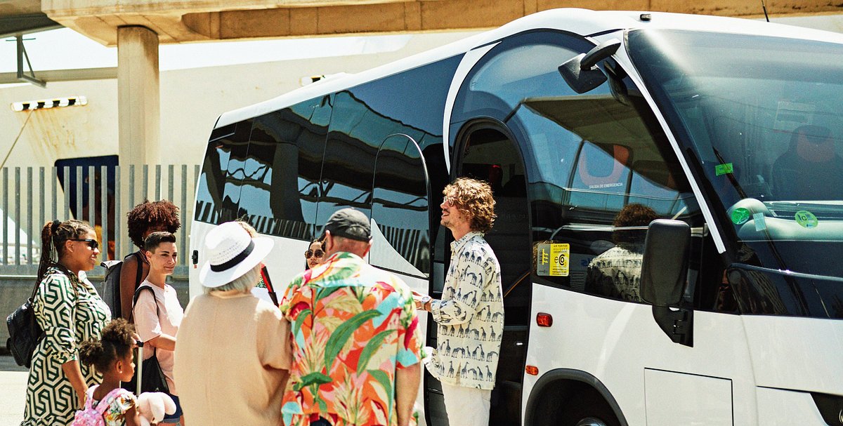 Dubai airport shuttle bus picking up passengers from hotel