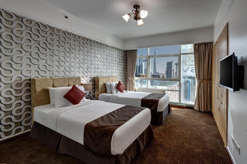 Emirates Grand Hotel Dubai Sheikh Zayed Road 47 storey fully halal alcohol free Muslim friendly hotel