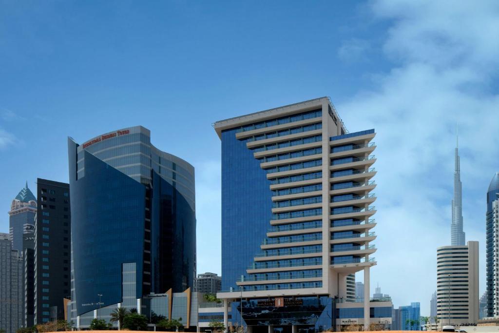 The First Collection Business Bay budget hotel with rooftop pool and Dubai skyline views