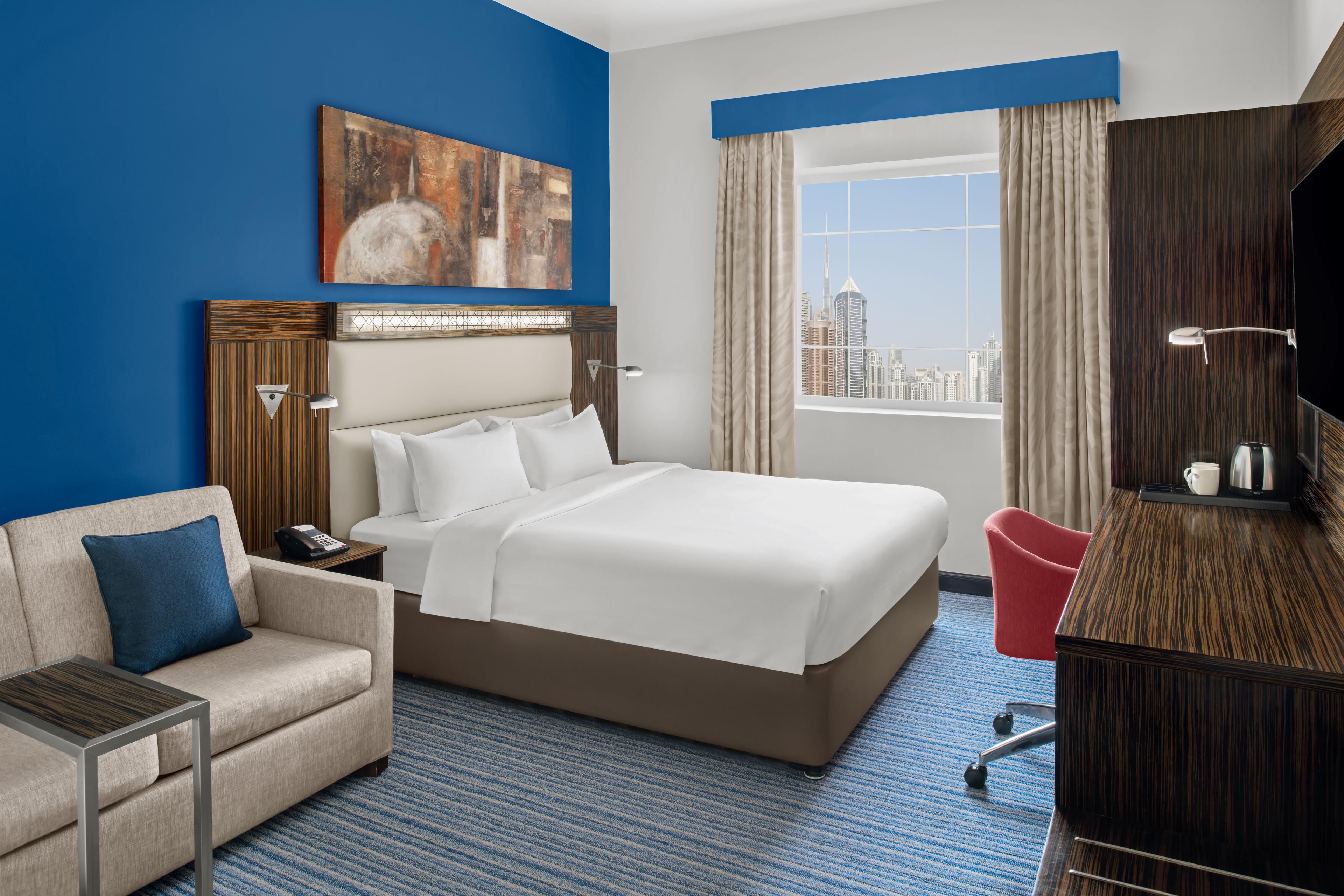 Holiday Inn Express Safa Park suite with kitchenette and free breakfast
