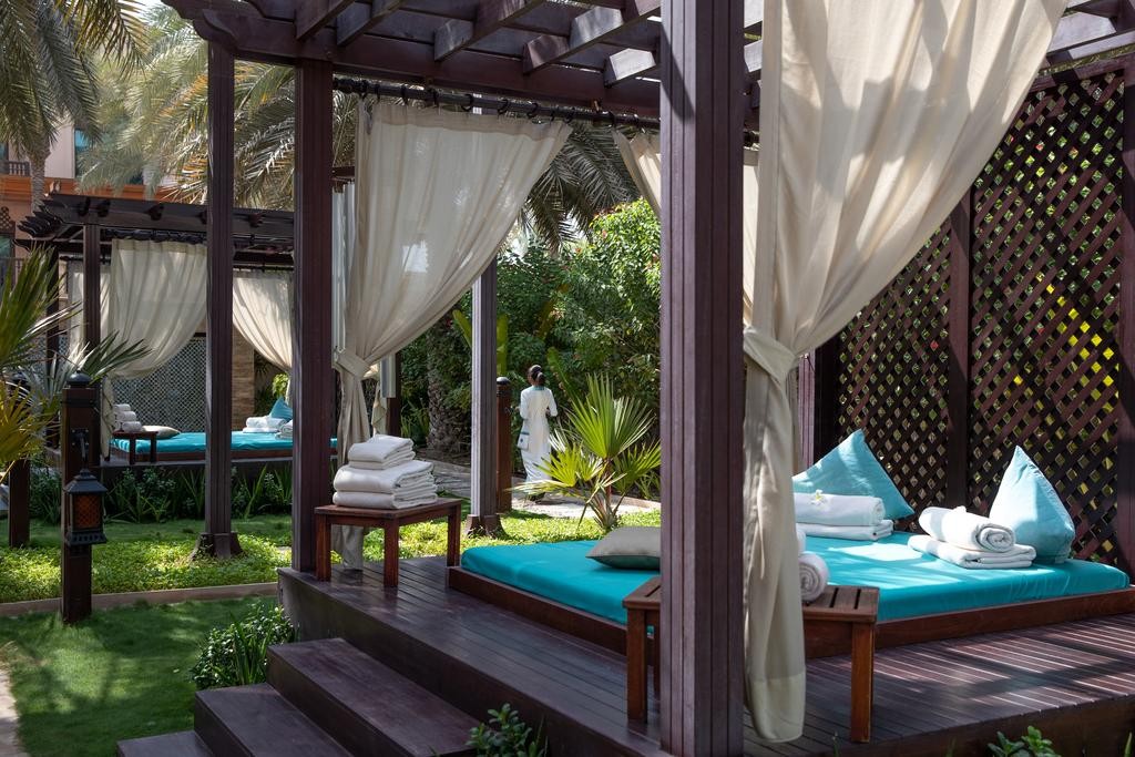 Jumeirah Dar Al Masyaf summerhouse villa waterway with Burj Al Arab at sunset