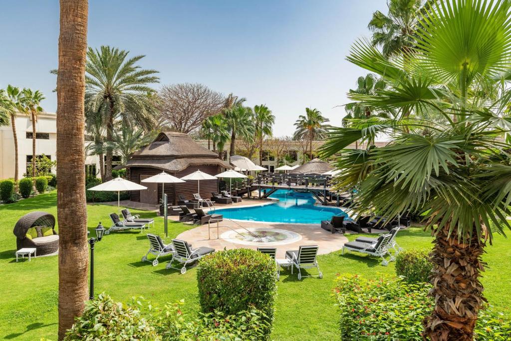 Le Méridien Dubai Hotel with 24/7 check-in and luxury pool access