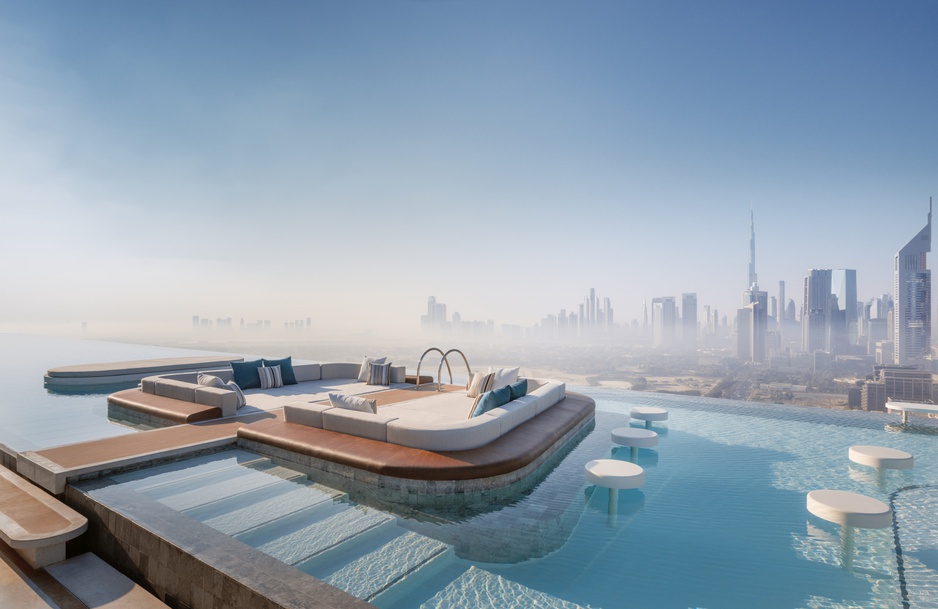 One&Only The Palm rooftop pool with Arabian Gulf and Palm Jumeirah views at sunset