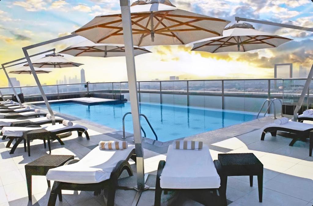 Park Regis Kris Kin Hotel best Bur Dubai Karama with Burj Khalifa view rooftop pool