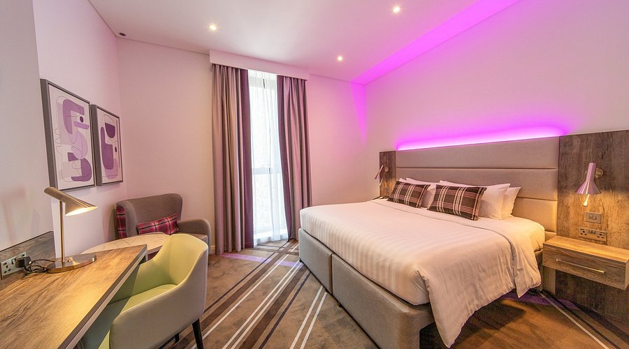 Premier Inn Dubai International Airport budget solo female traveler hotel with 24/7 free shuttle and UK brand reliability