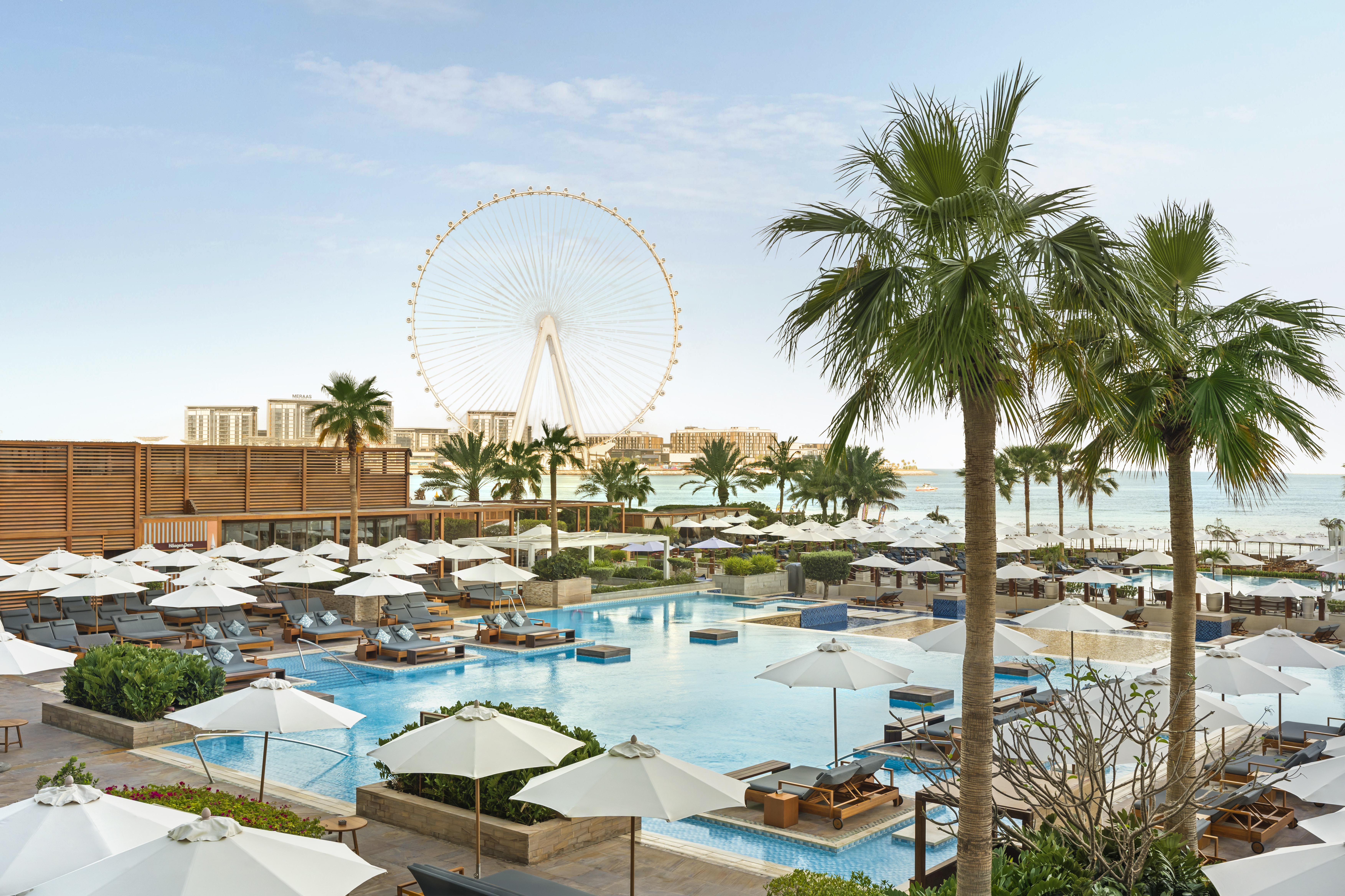 Rixos Premium Dubai JBR beachfront hotel with private beach, pool area and Palm Jumeirah views