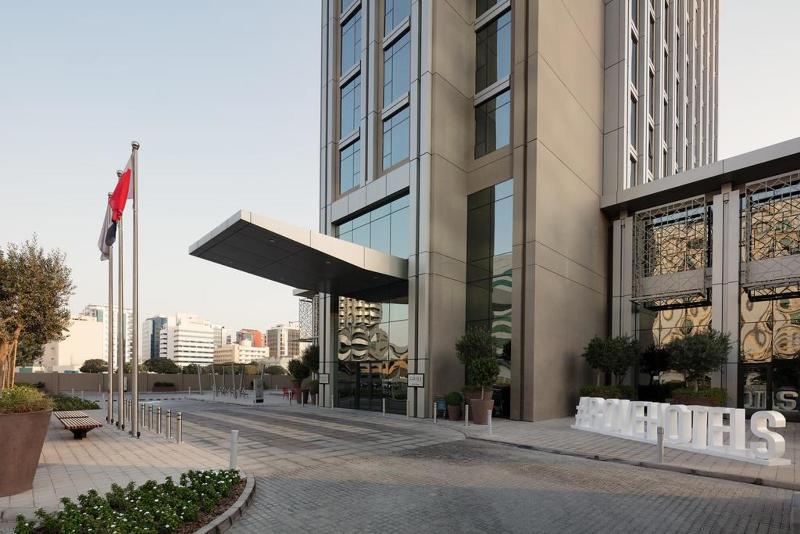 Rove Trade Centre Dubai outdoor pool and lobby area between old and new Dubai