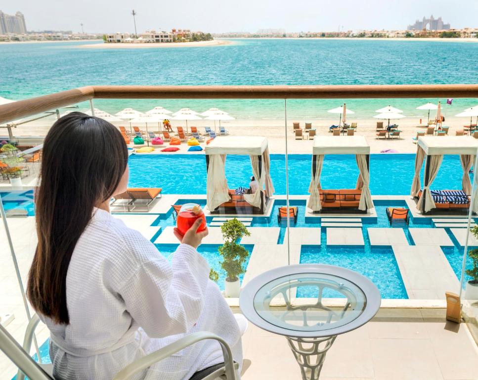 Royal Central Hotel The Palm executive suite with jacuzzi on balcony overlooking Palm Jumeirah