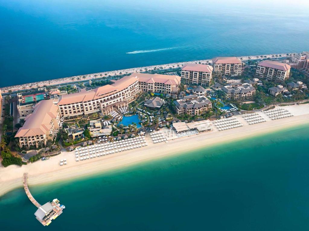 Sofitel Dubai Jumeirah Beach hotel exterior on The Walk JBR with beach access and Dubai Marina skyline